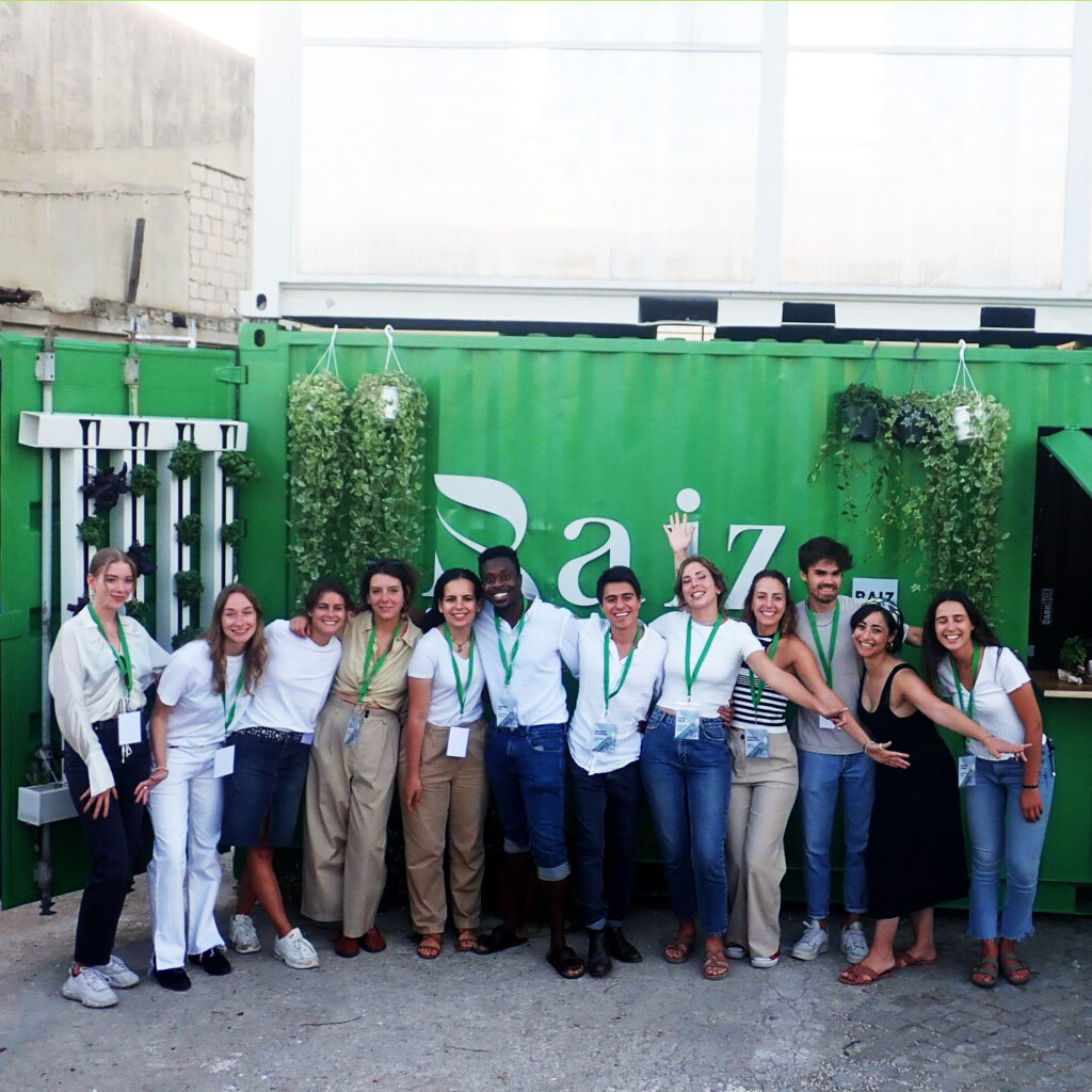 The team at Raiz Vertical Farms in front of their concept farm in Lisbon.